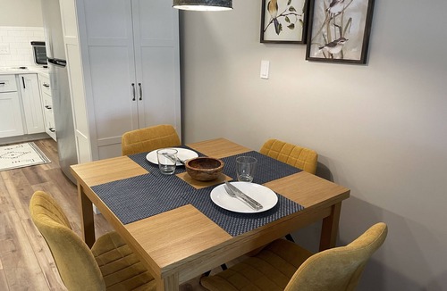 Greensboro Apartment | Axes & Roses: King Bed Forest Hideaway with Kitchen. Quiet retreat.