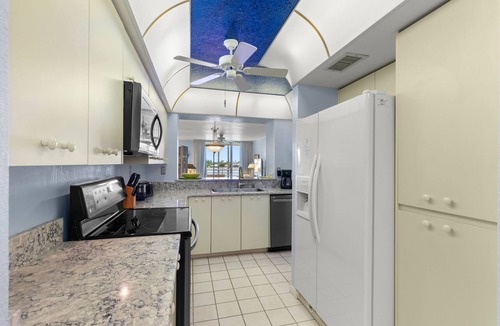 St. Petersburg Condo | Bahia Vista 8-314 | Balcony with Water Views, Resort Pool + Hot Tub