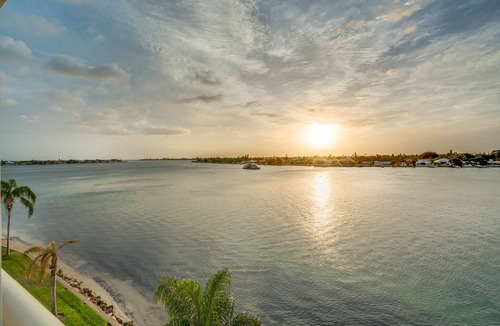 St. Petersburg Condo | Bahia Vista 8-314 | Balcony with Water Views, Resort Pool + Hot Tub