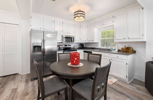 Saint Simons Island Cottage | Beach Cottage with large deck-One short block to beach-Walk to shops & dining!