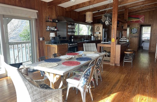 Alligator Point House | BEACH FRONT to BAY with boatdock, swimming pool, pickleball courts and kayaks.