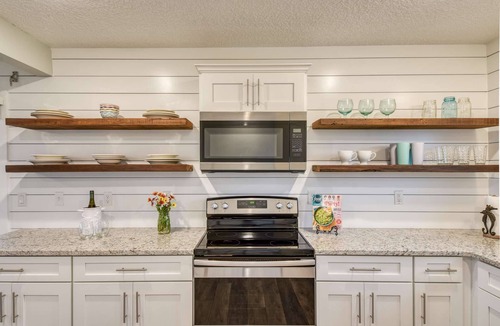 Butler Beach Apartment | BEACHFRONT NEW Heated POOL, Oceanfront Porch and View from Entire Living Space! Private Beach Access