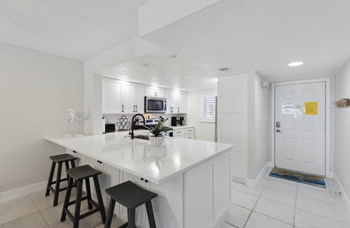 Cocoa Beach Condo | Beachside Ground-Floor Condo– Steps to the Beach W/Heated Pool & Private Patio