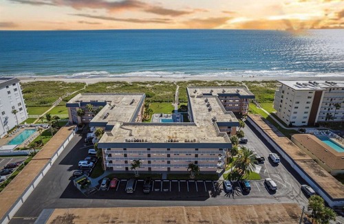 Cocoa Beach Condo | Beachside Ground-Floor Condo– Steps to the Beach W/Heated Pool & Private Patio