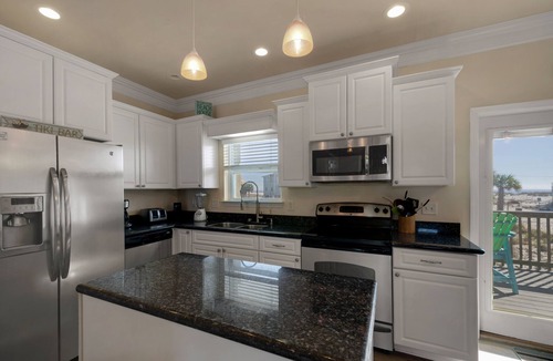 Villa Primera House | Beachside Haven: Spacious 6-Bedroom Retreat Just Steps from the Sand