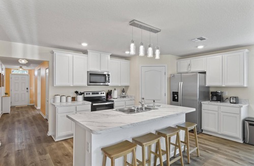 Indian Trails House | Beachy Keen Retreat | Palm Coast | Close To Golf & Beach | Dog Friendly Fenced Yard | Garage Access