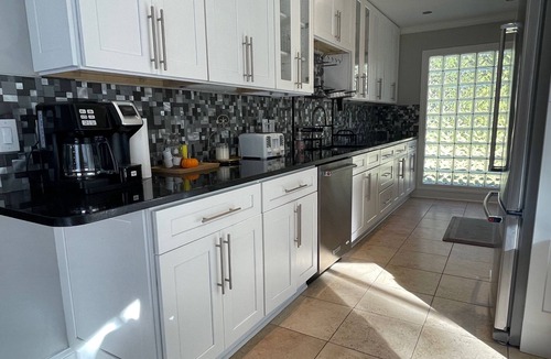 St. Augustine House | Beautiful 3 bedroom building with swimming pool surrounded by wooded area .