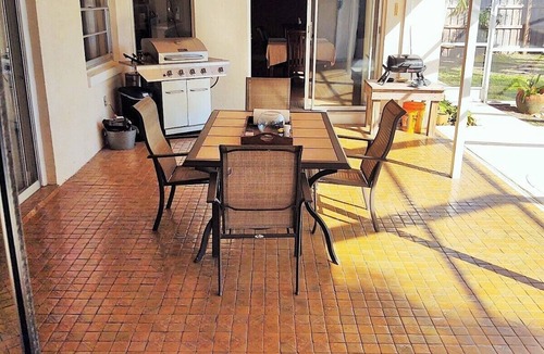 Villa De Palmas House | Beautiful Beach Style Home by Port Canaveral w/Private Salt Water pool