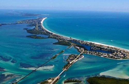 Pebble Beach House | Beautiful Canal & Gulf Waterfront Home