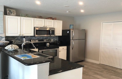 Madeira Beach Condo | Beautifully Updated Madeira Bay Resort Unit 401 - Steps from Sand and Fun!