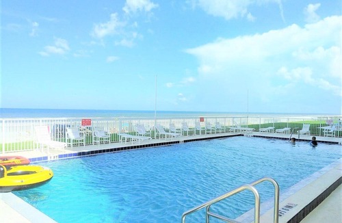 New Smyrna Beach Condo | BEST OF BOTH WORLDS! Flagler Ave restaurants, bars, shops & direct ocean front
