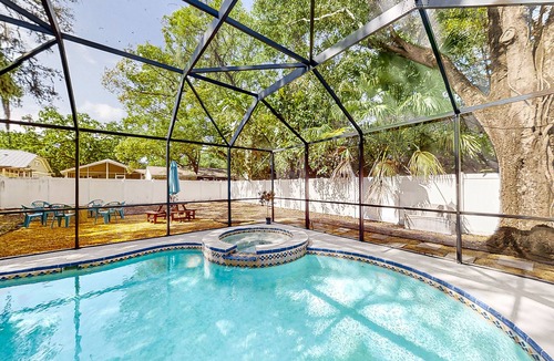 Old Seminole Heights House | Bright & airy home with screened private pool, grill, & fenced yard