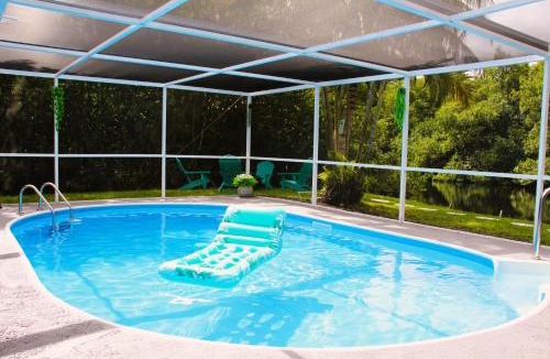 Fort Myers House | Bring Snacks and Relax! Waterfront, Heated pool, Cribs, Pets, Rods, BBQ
