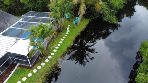 Fort Myers House | Bring Snacks and Relax! Waterfront, Heated pool, Cribs, Pets, Rods, BBQ