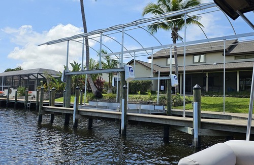 Lochmoor Waterway Estates House | Bring your boat to tie up to the new dock with easy access to the Caloosahatchee