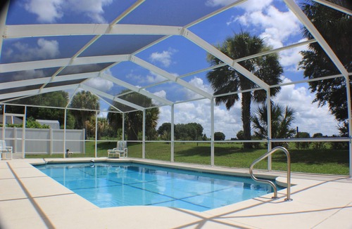 Inverness House | Bursting with Sunshine Pool Home S & G by RedAwning
