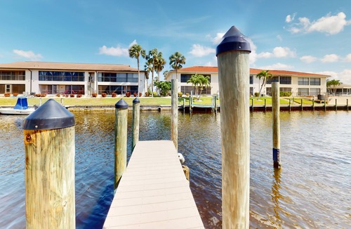 Caloosahatchee Condo | Canal front condo with boat slip, pool access, private deck & fast WiFi