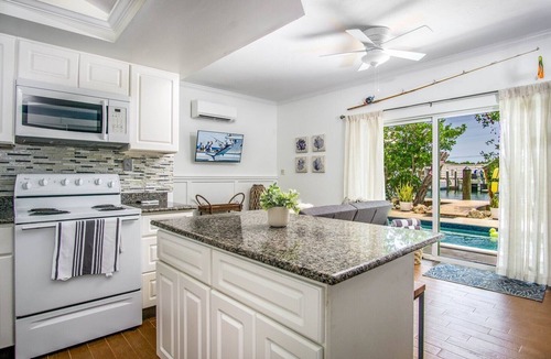 Venetian Shores House | Canal Front Oasis with Private Pool: Your Perfect Waterfront Getaway!