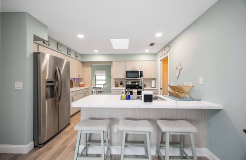 Pebble Beach House | Canal-Front Pool Home near Gulf Beaches & Golf + exclusive local perks!