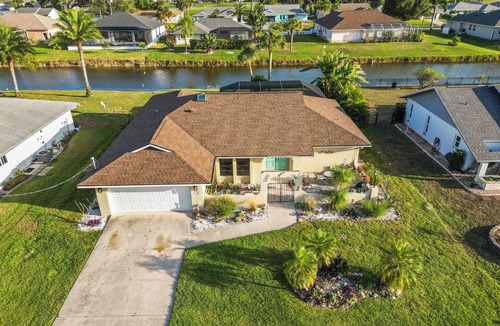 Pebble Beach House | Canal-Front Pool Home near Gulf Beaches & Golf + exclusive local perks!