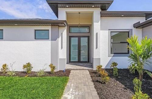 Diplomat House | Cape Coral home with pool and game room