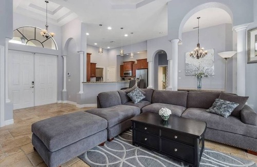 Trafalgar House | Casita Cabo Coral on Gulf Access Canal with Heated Salt Pool & Spa