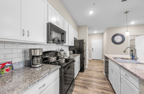 Melbourne Condo | Charming 2-bedroom condo with fitness room and AC in Melbourne