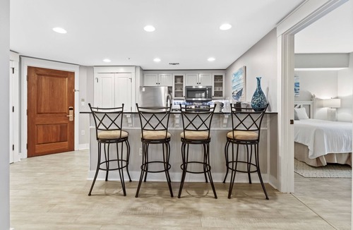 Baytowne Wharf Condo | Charming 2BR at Wharf! Beach, Tropical Pool + Hot Tub, Tram, Spacious Balcony