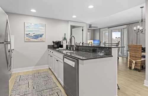 Baytowne Wharf Condo | Charming 2BR at Wharf! Beach, Tropical Pool + Hot Tub, Tram, Spacious Balcony