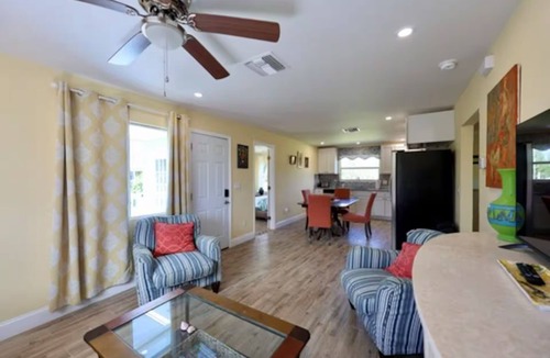Flamingo Bay House | Charming 3-bedroom upstairs unit in a house with a shared pool in pine island