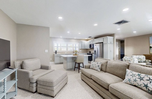 Lochmoor Waterway Estates House | Charming and sleek pool home, family friendly with canal access to river, WIFI