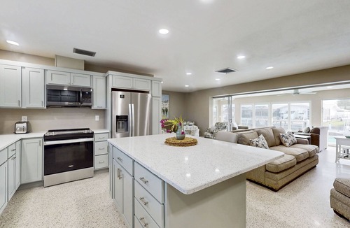 Lochmoor Waterway Estates House | Charming and sleek pool home, family friendly with canal access to river, WIFI