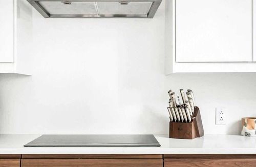 Arts District Condo | Charming condo with central AC, full kitchen, & tasteful decor