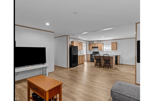 Supply House | Charming house close to Holden Beach in Supply with ample parking for your boat.