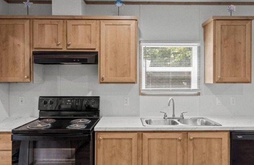 Supply House | Charming house close to Holden Beach in Supply with ample parking for your boat.
