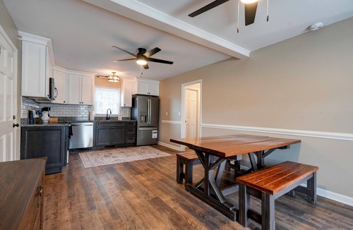 Crouse House | Charming house in a golf course community with lake views and a big yard.