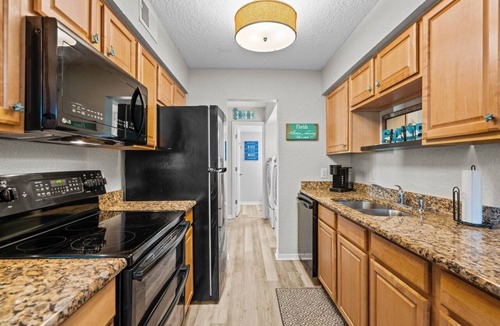 St. Augustine Beach Condo | Colorful condo w/shared pool, free WiFi, central A/C - blocks from the beach