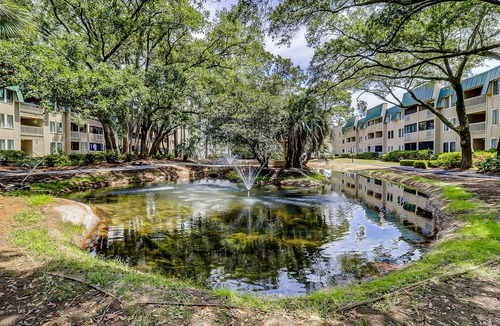 Palmetto Dunes Villa | Condo by the beach with heated pools, hot tub, patio, tennis, central AC, & W/D