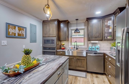 Olmstead House | Covered Patio, Fire Pit & Grills: Olmstead Getaway