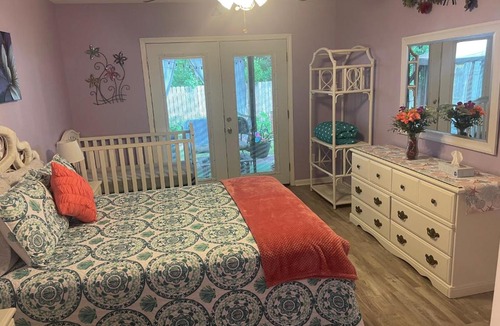 Cedar Grove House | Cozy bedroom with on suite living room