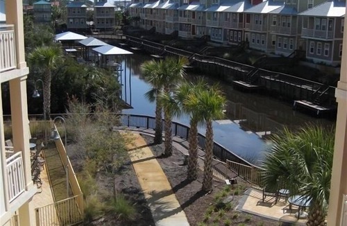 Waterside Village Condo | Cozy Coastal Condo – Walk to Beach, Dine, & Relax!