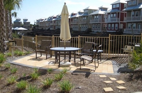 Waterside Village Condo | Cozy Coastal Condo – Walk to Beach, Dine, & Relax!