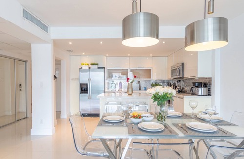 Sunny Isles Beach Condo | Cozy designer condo across from the beach. WiFi, parking, tennis and more!