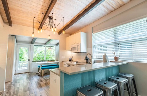 East Beach House | Crafted by a shipwright. Anchored in time. The Shipwright's Bungalow sleeps 9