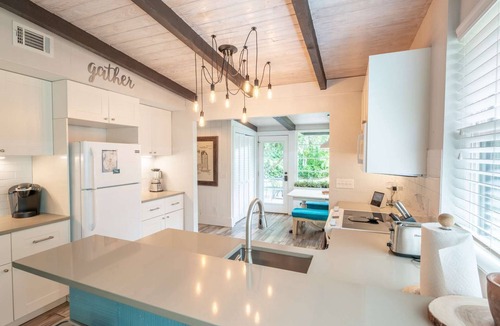 East Beach House | Crafted by a shipwright. Anchored in time. The Shipwright's Bungalow sleeps 9