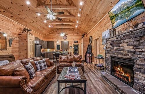 Sevierville Cabin | Creekside on the Bluff: Pet Friendly, Free Attraction Tickets, & Creek View