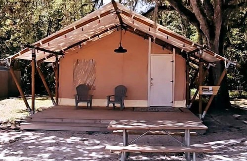 Okeechobee RV Rental | Deluxe Safari Tent with Hammocks & Fire Pit Retreat in Basinger, Florida