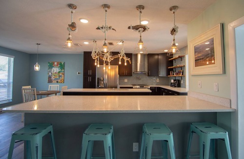 Indian Harbour Beach House | DOG Friendly BEACHSIDE 4BR/3BA, Solar/Saltwater Pool, No Smoke +Special Offers