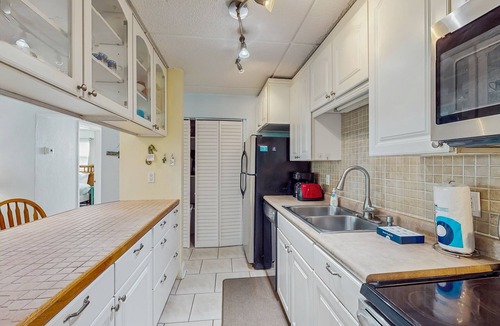 Port Canaveral Condo | Dog-Friendly Condo in Quiet Neighborhood Near Beach with Central A/C & Free WiFi
