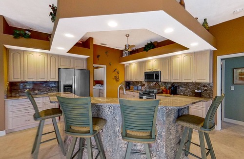 Matlacha Isles House | Dog-friendly waterfront home with heated pool, lanai, central AC, & W/D